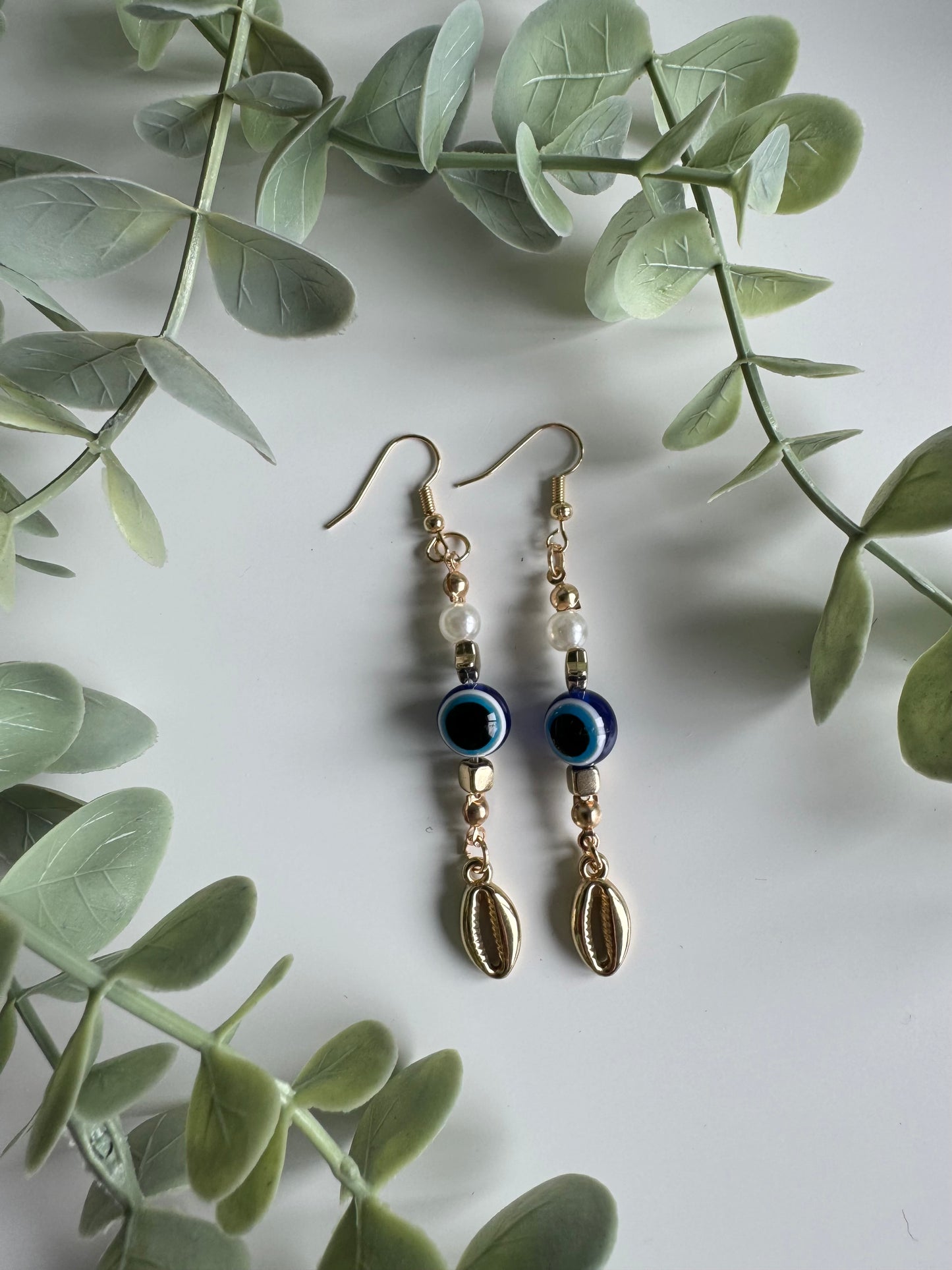 Evil eye drop earrings.