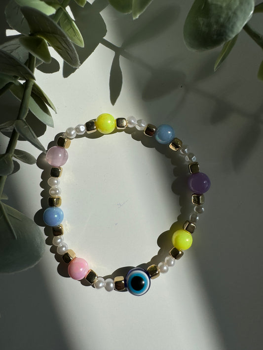 Evil eye and pastel pearls bracelet.