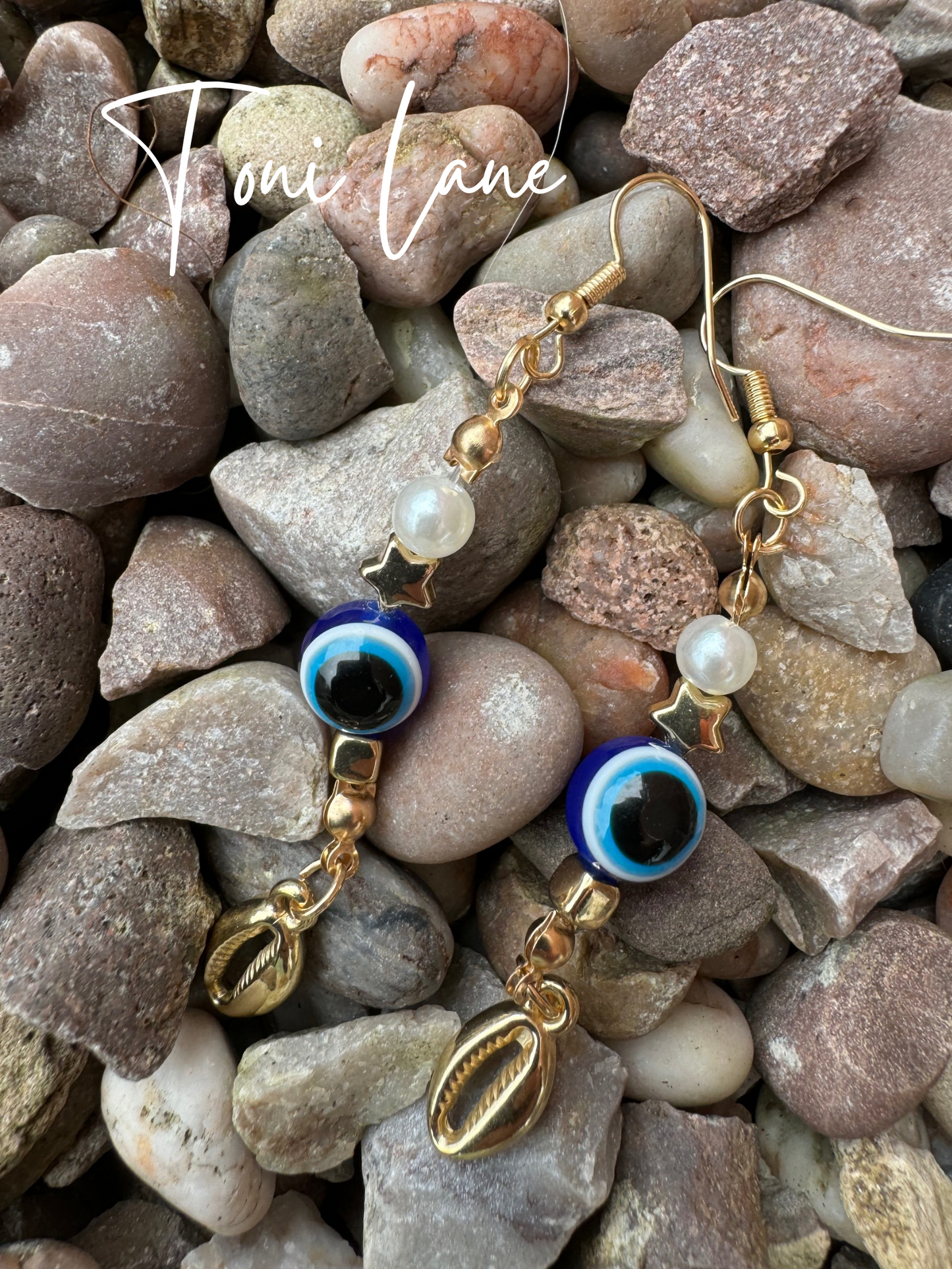 Evil eye drop earrings.